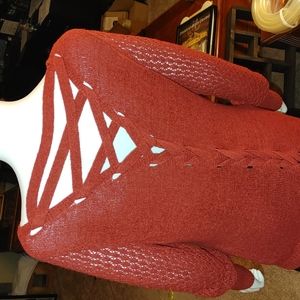 Burnt orange sweater with crisscross back. Great condition. Lightly used.